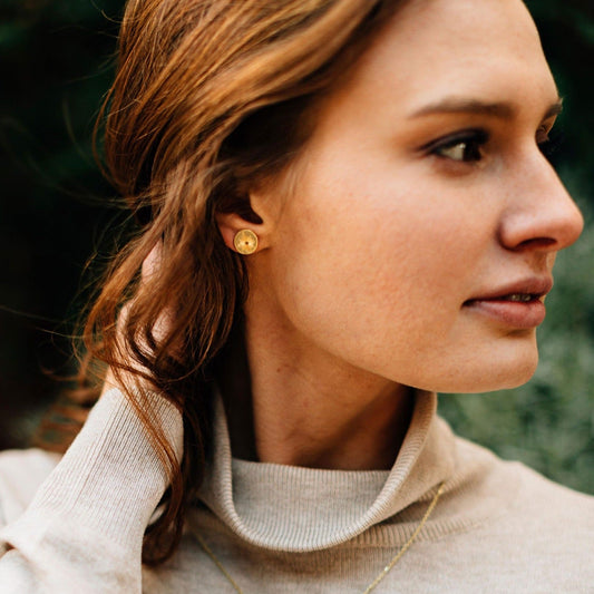 Earrings post many pointed star bombshell .25D br