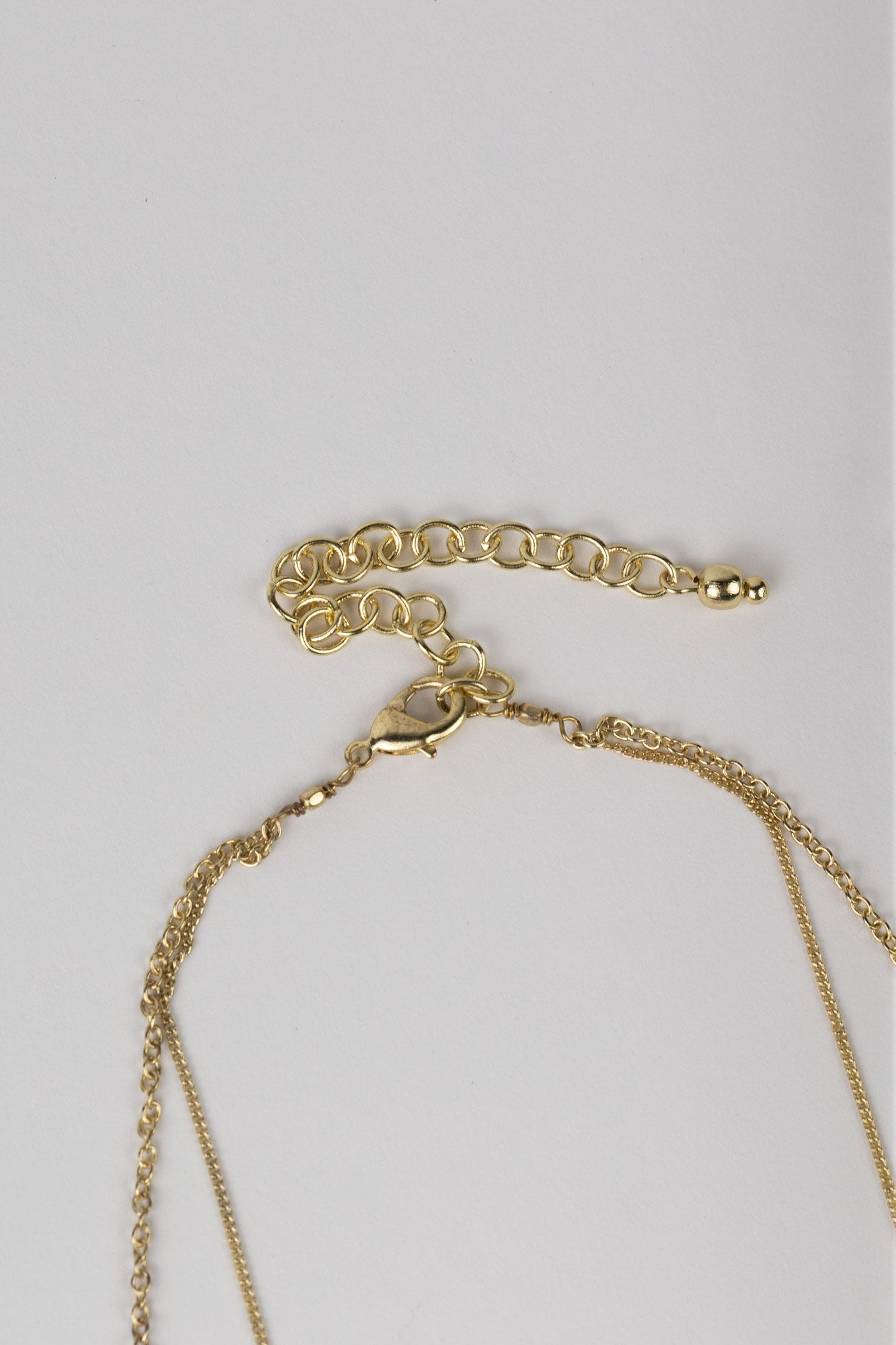 Necklace pale sun w/pend bone/wd/br 26L gld/brn