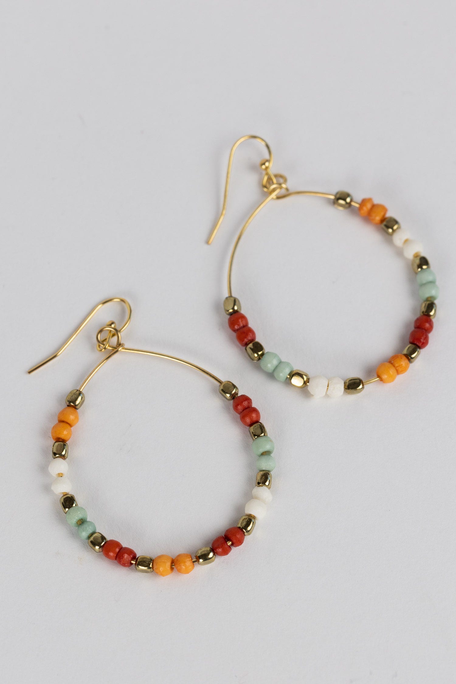 Earrings large hoop peachy bone/br 2.5L mid-tone