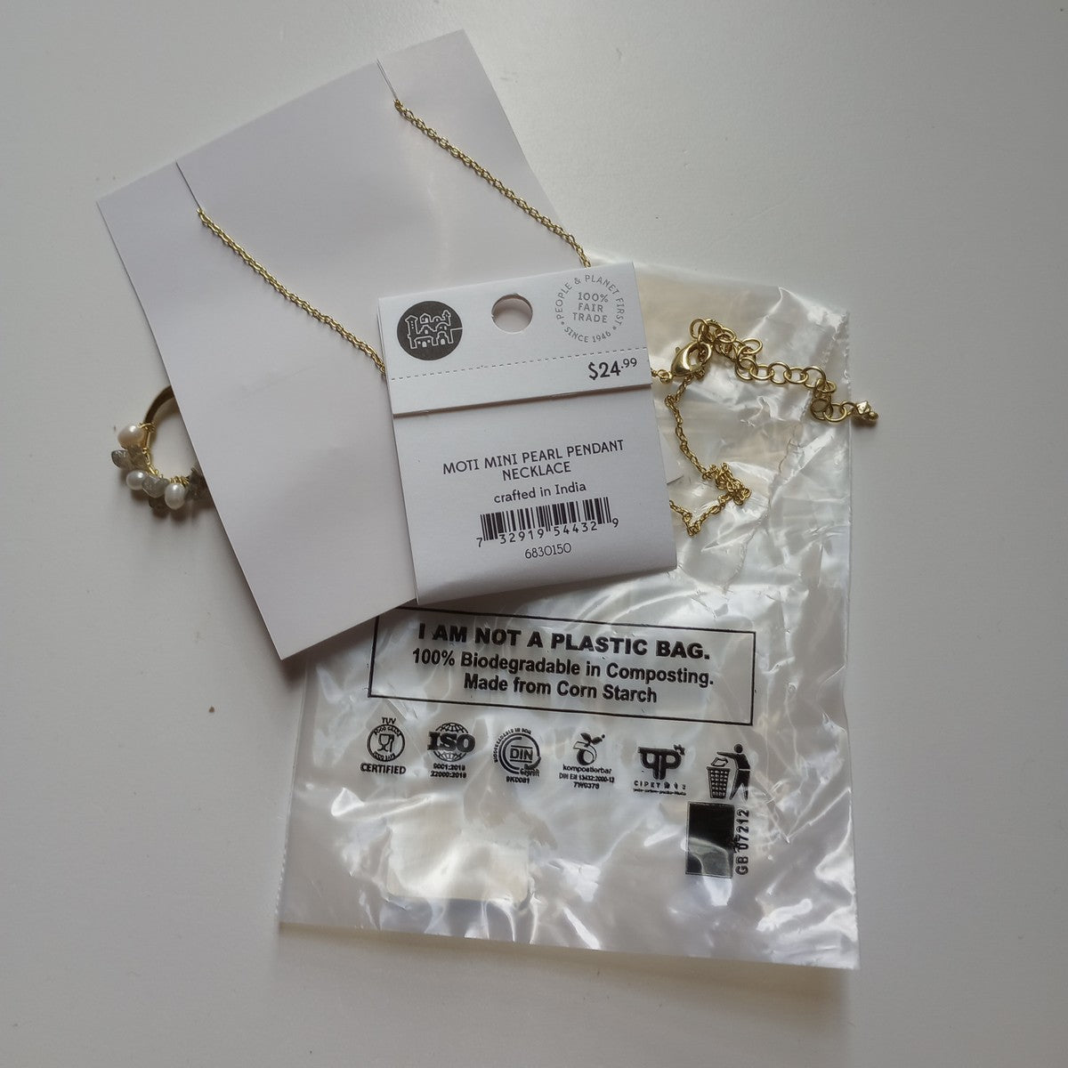 Necklace wrapped oval pearl/stn/br 19L gld/crm