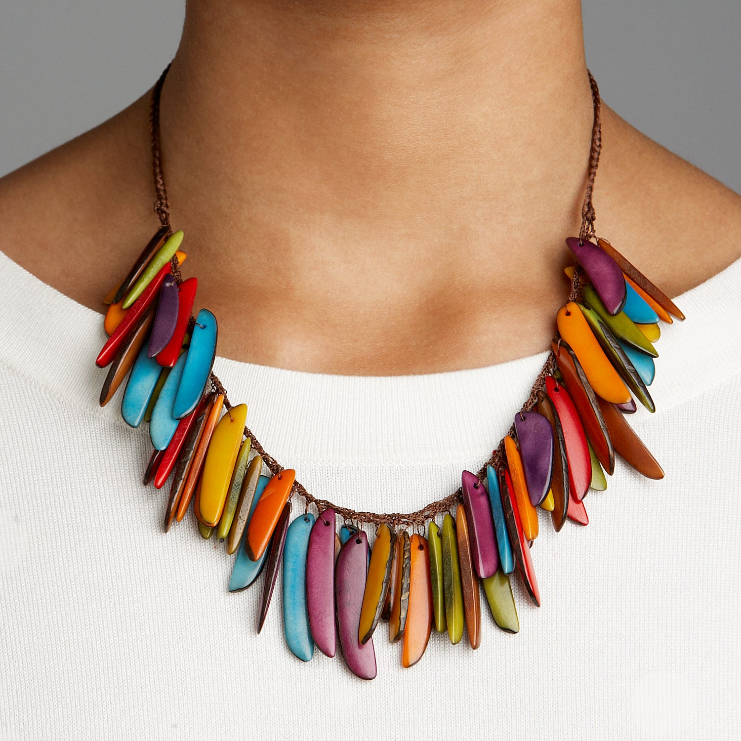 Necklace hanging thin slices tagua/cord multi