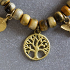 Bracelet beaded charm horn/lthr/brass adj nat/br
