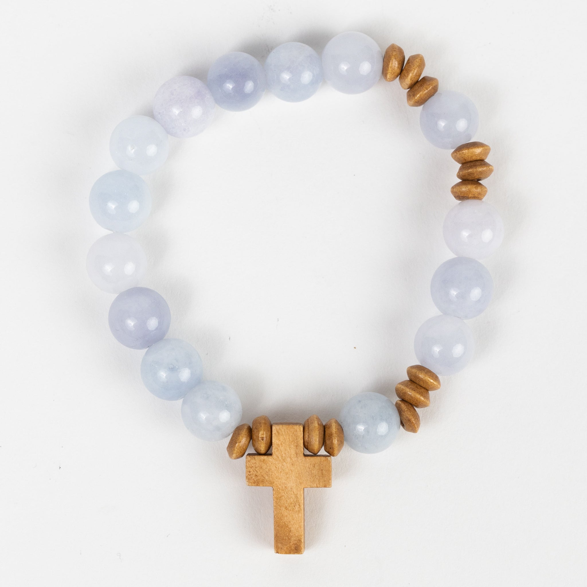 Bracelet stretch w/cross charm stn/wd lt blu/brn