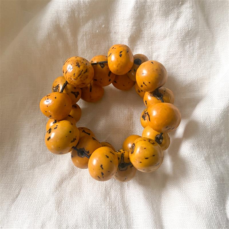 Bracelet large round beads tagua adj yellow/black