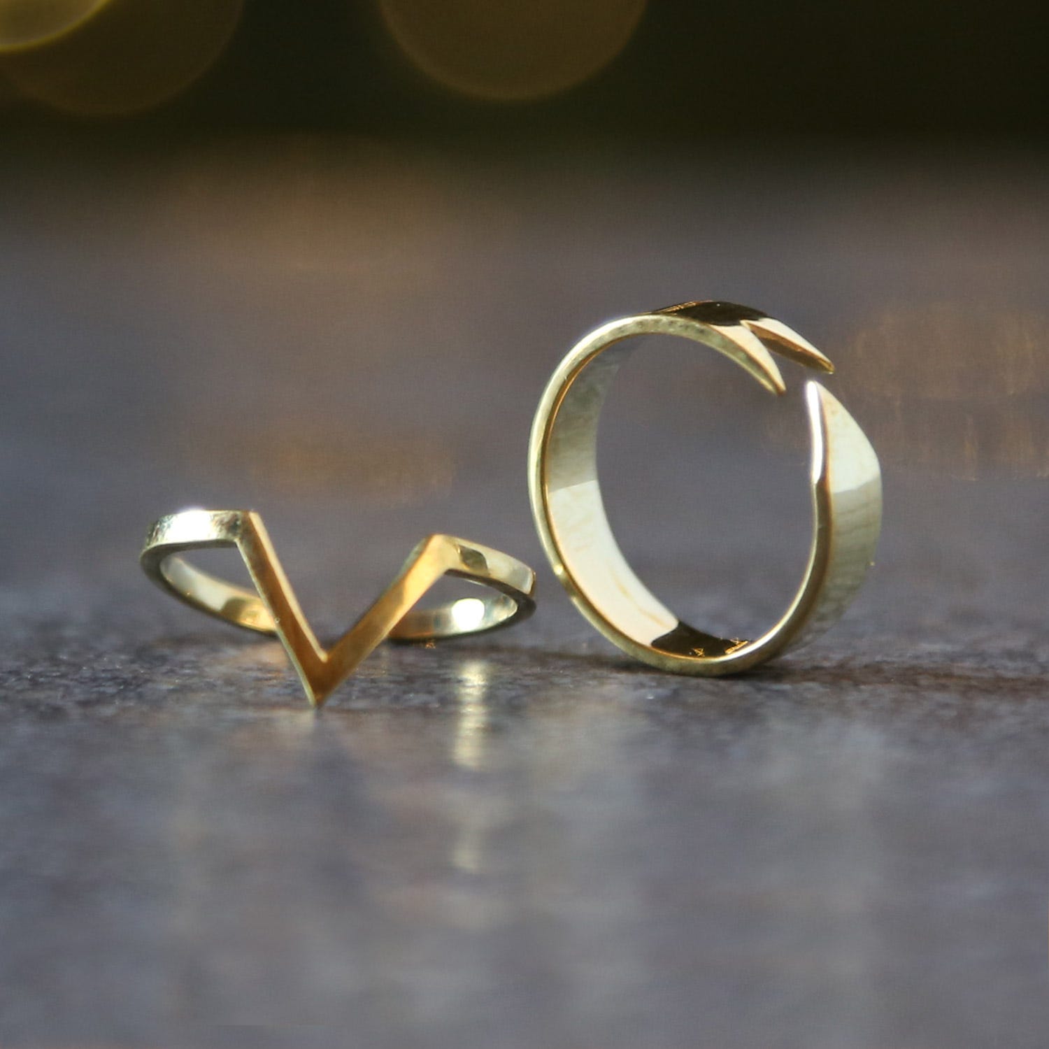 Ring open V bomb shell brass .75D