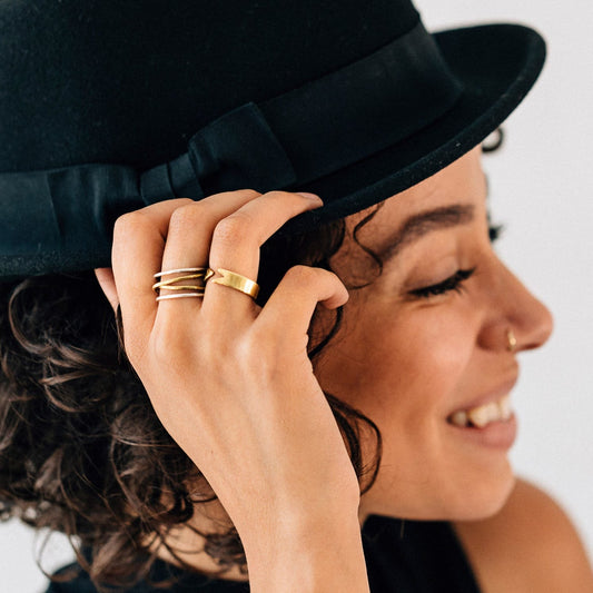 Ring crossing spiral bombshell .5W silver/brass