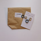 Earrings dangle 2 crcl horn/steel 1.5L blu/crm