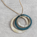 Necklace 3 crcl pend horn/cord 36L tan/cream/blue