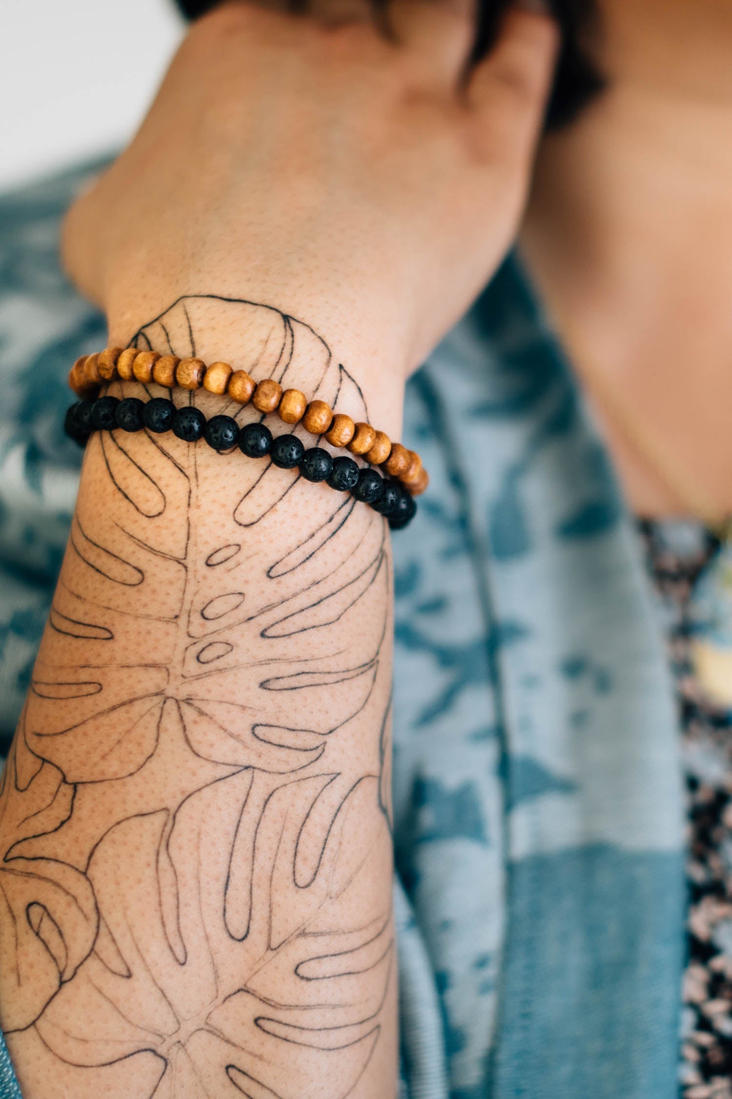 Bracelets to share s/2 w/card lava stn/wd blk/brn
