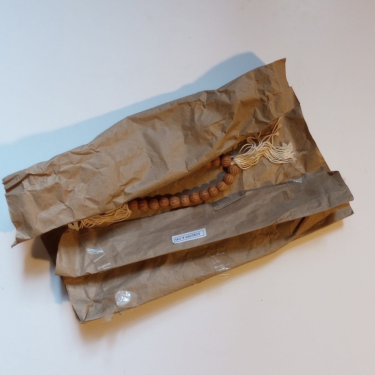 Garland tassels/beads t-cotta/cttn 60L t-cotta/wht