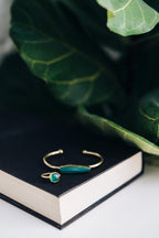 Ring green onyx/brass adj green/gold