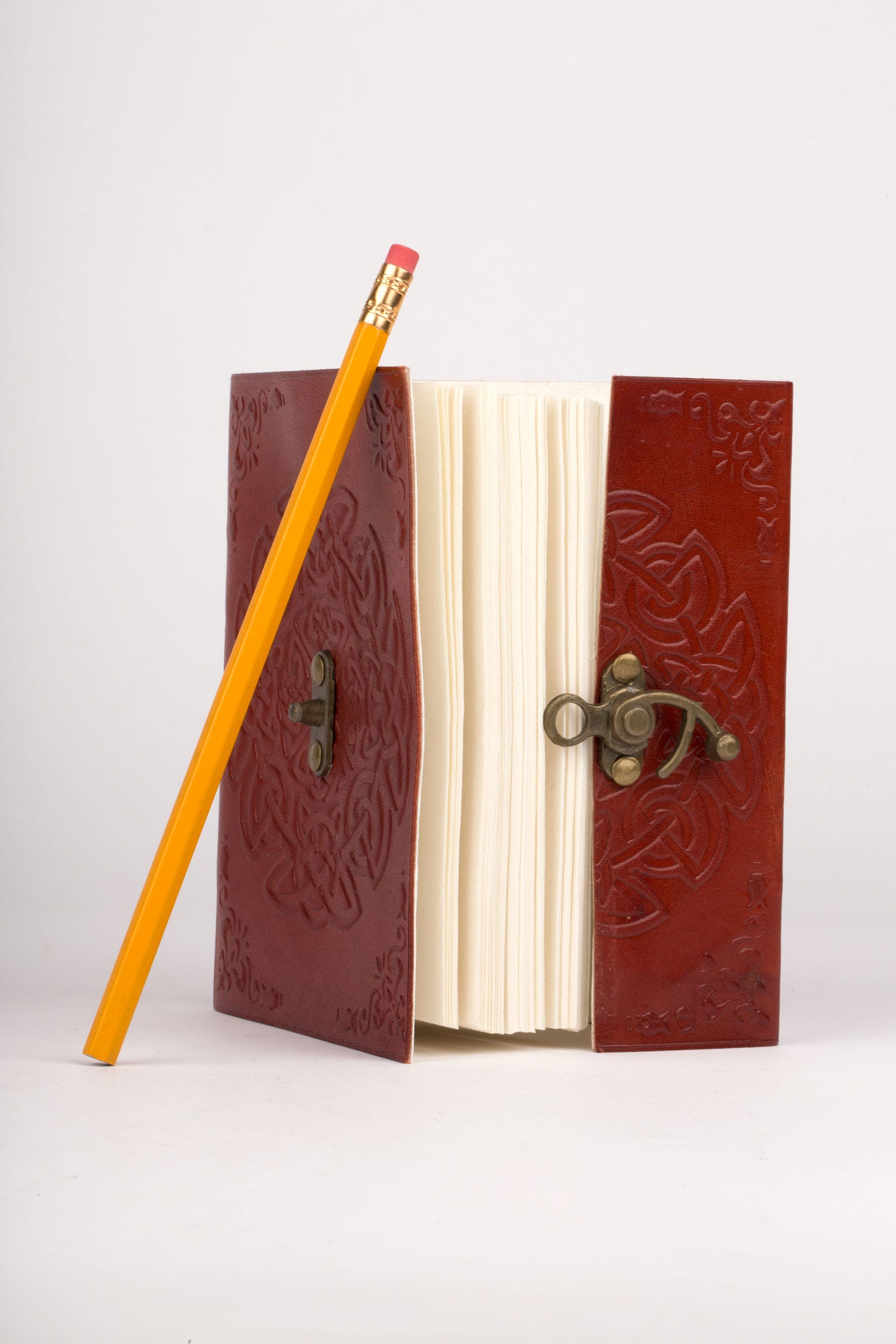 Journal knot embossed leather 6x4 rust