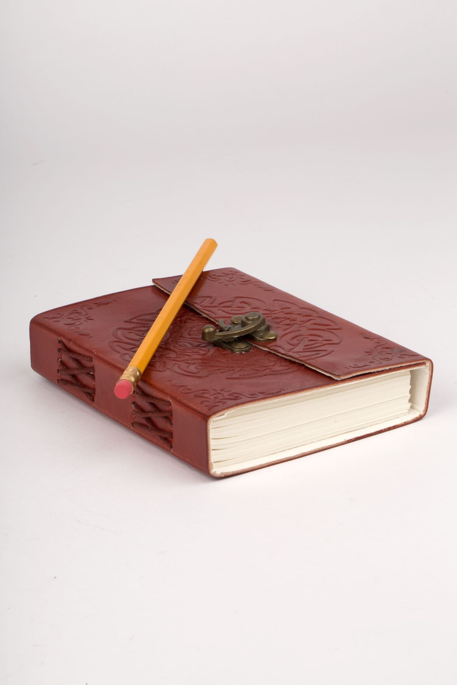 Journal knot embossed leather 6x4 rust