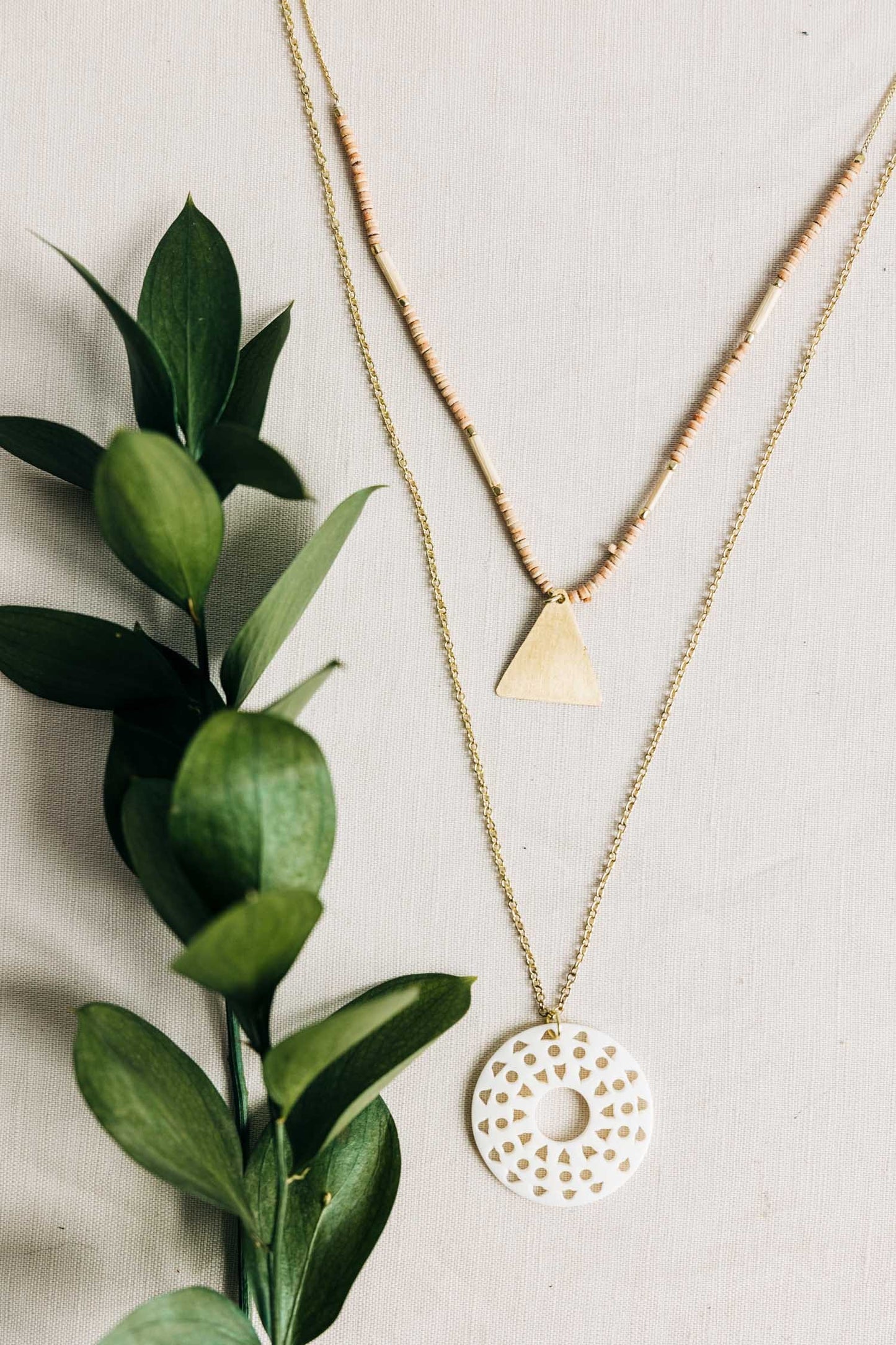 Necklace pale sun w/pend bone/wd/br 26L gld/brn