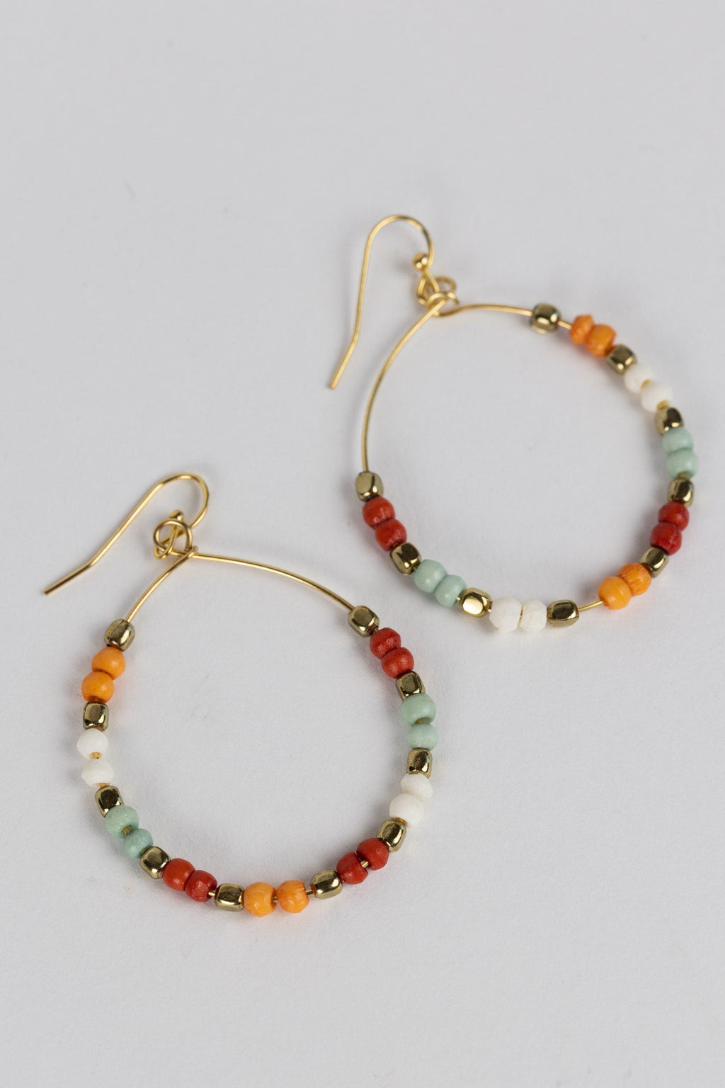 Earrings large hoop peachy bone/br 2.5L mid-tone