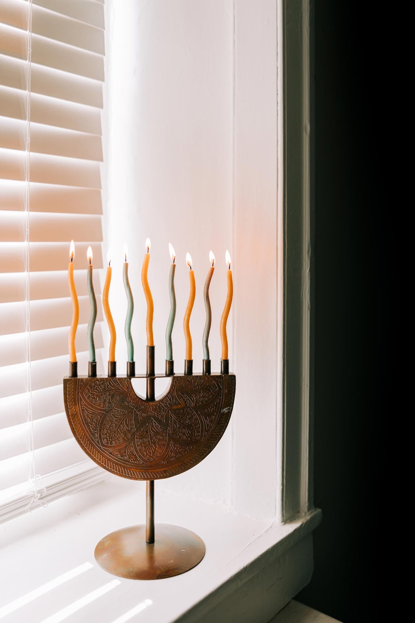 Menorah engraved iron 9Wx11H antiqued copper color