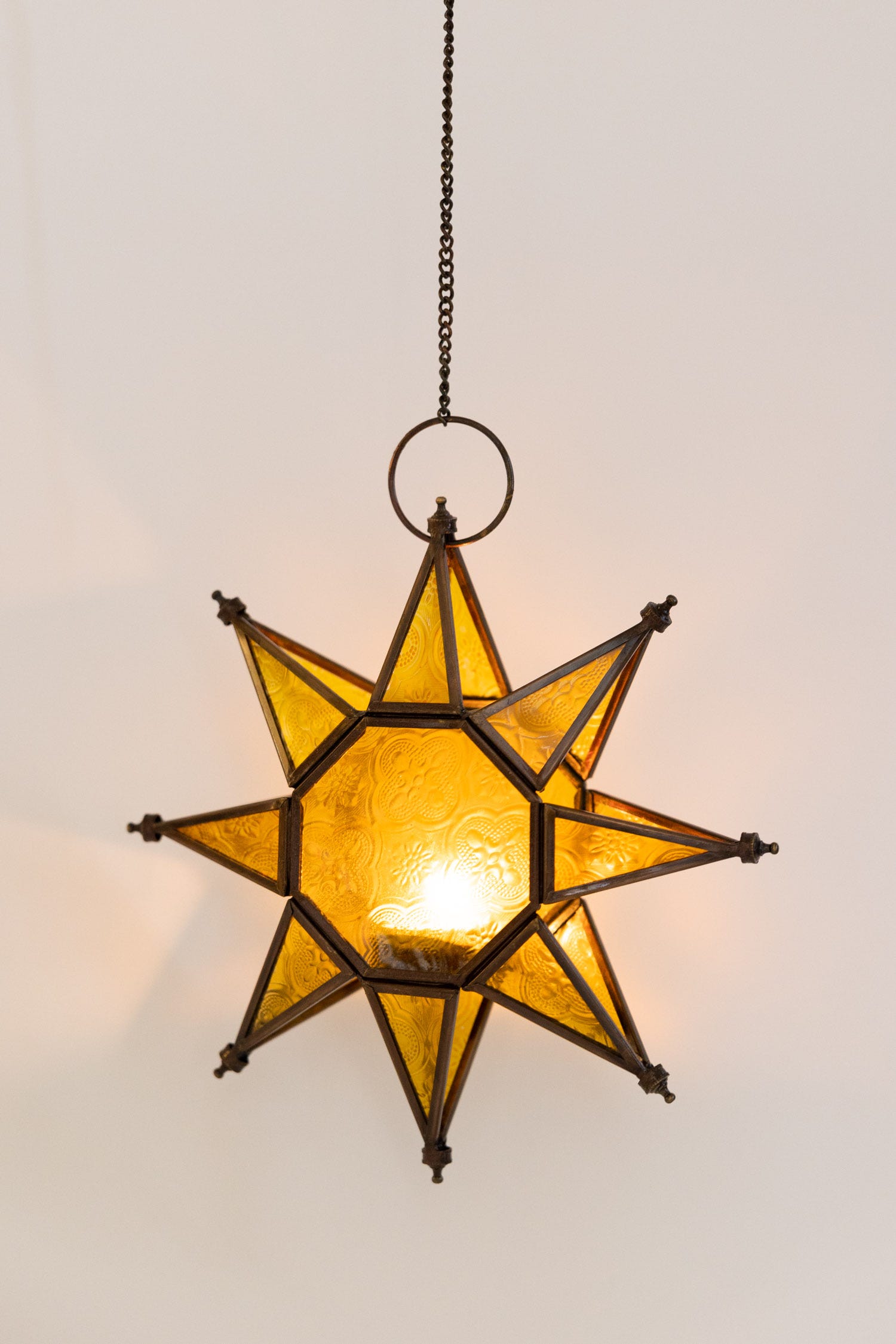 Candleholder star hanging brass/glass 8.5W yel