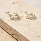 Earrings post studded hoop br/silv pltd .75D silv