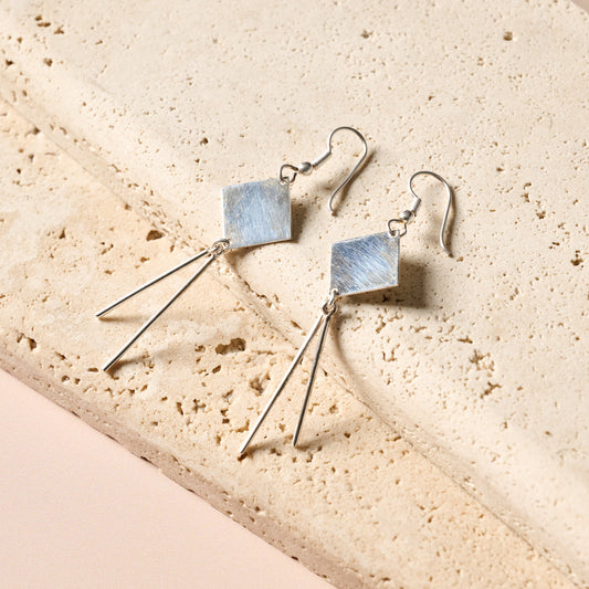 Earrings small sq w/spokes br/silv pltd 3L silv