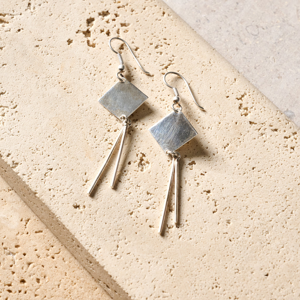 Earrings small sq w/spokes br/silv pltd 3L silv
