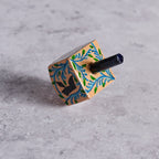 Dreidel vines M/2 pntd budloo wd 1sqx2.5H tan/blue
