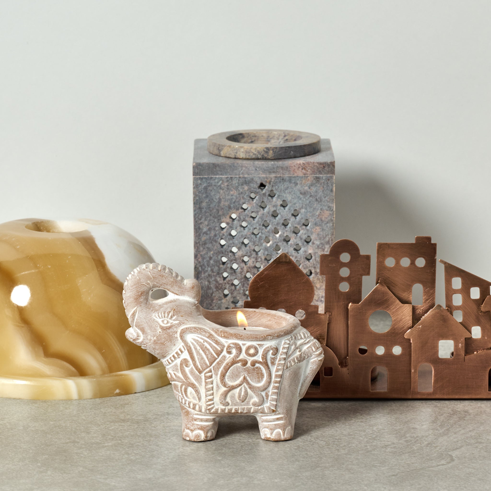 Candleholder village cutout iron 8Lx3.5H antq cppr