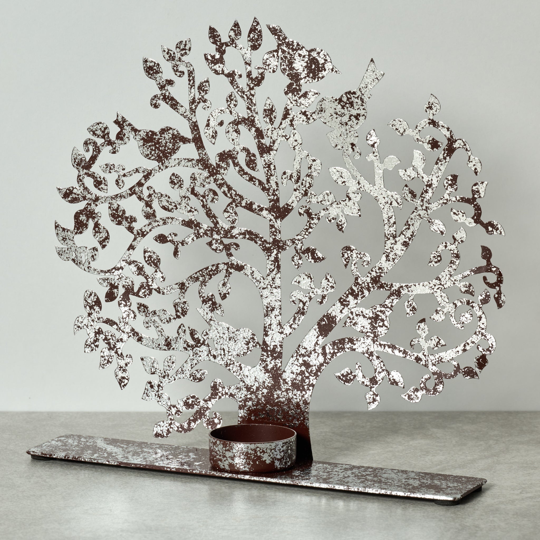 Candleholder tree cutout iron 9Wx8.5H rust/silv
