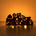 Candleholder village cutout iron 8Lx3.5H antq cppr