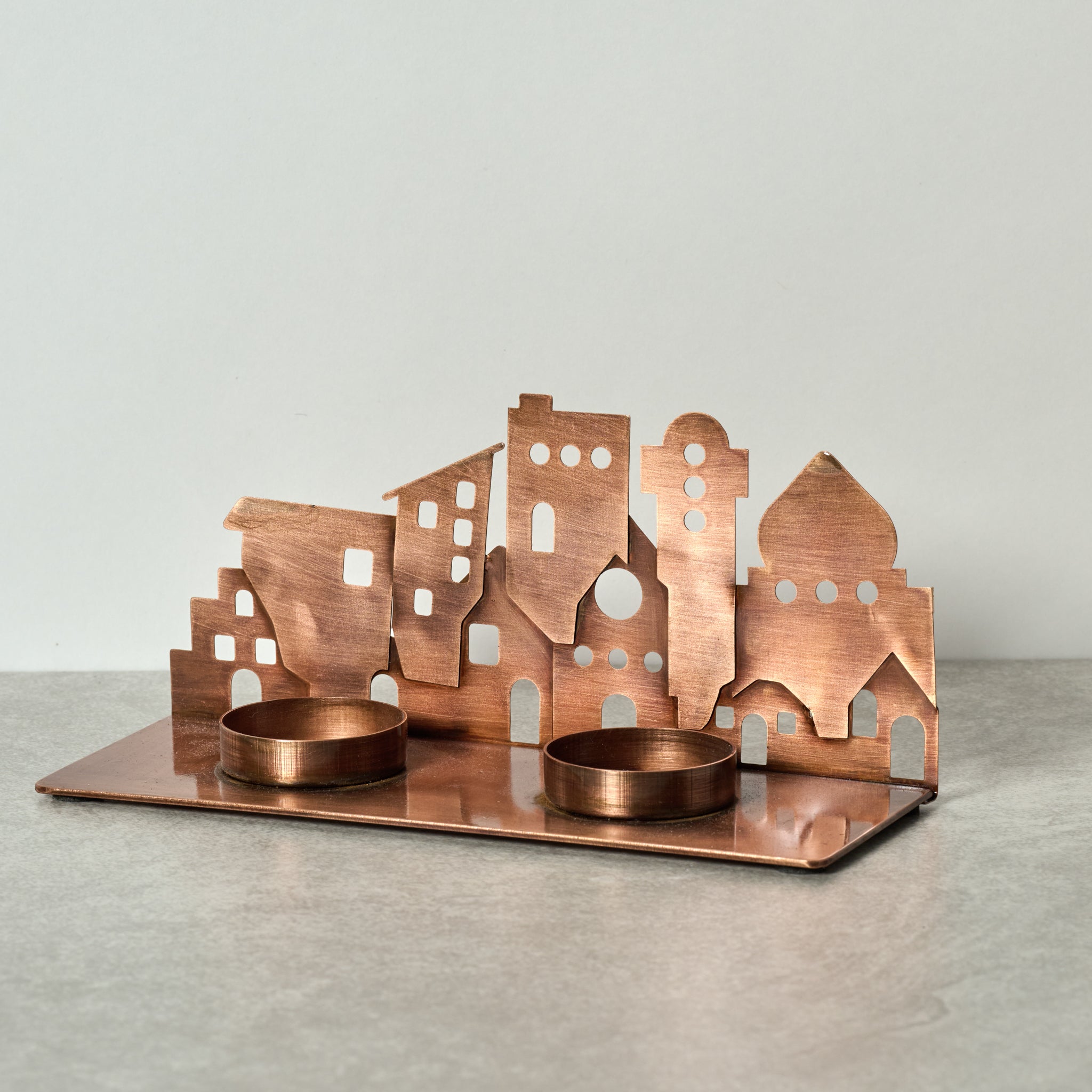 Candleholder village cutout iron 8Lx3.5H antq cppr
