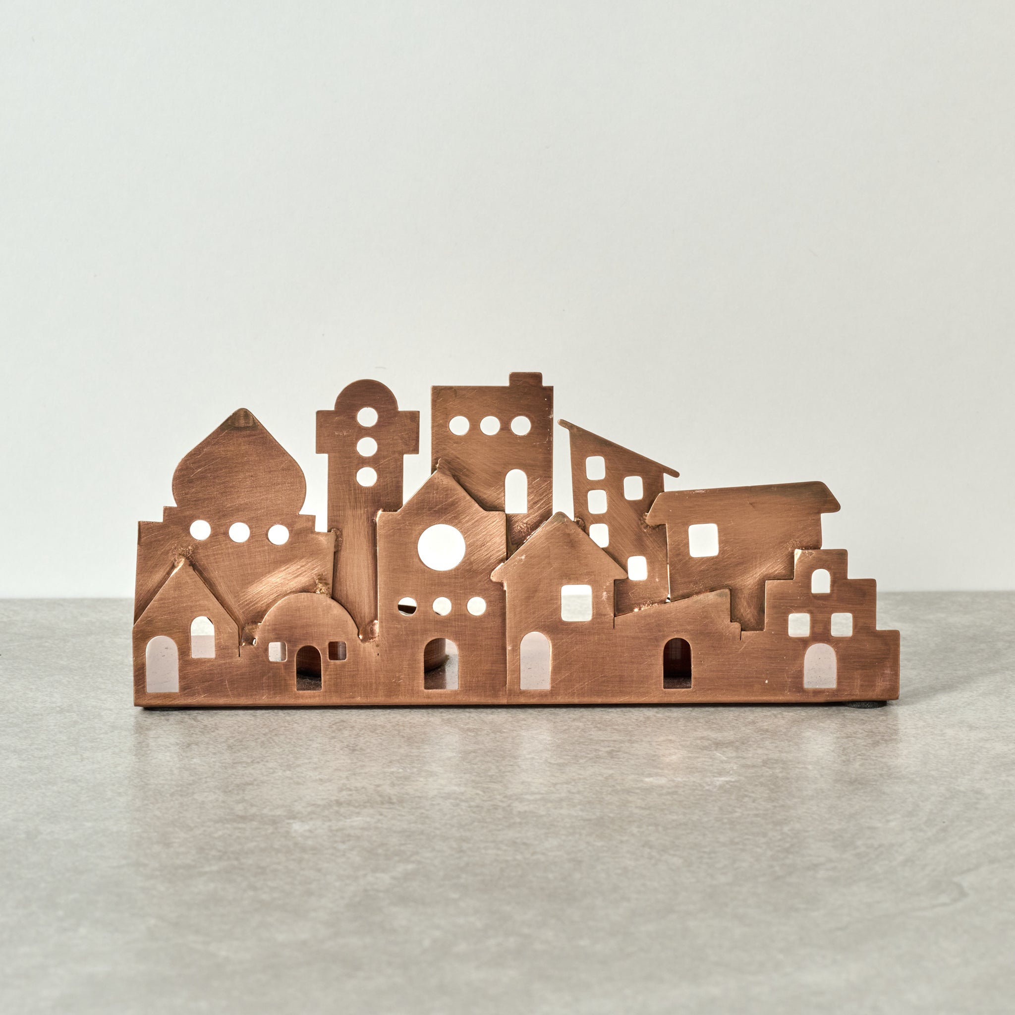 Candleholder village cutout iron 8Lx3.5H antq cppr
