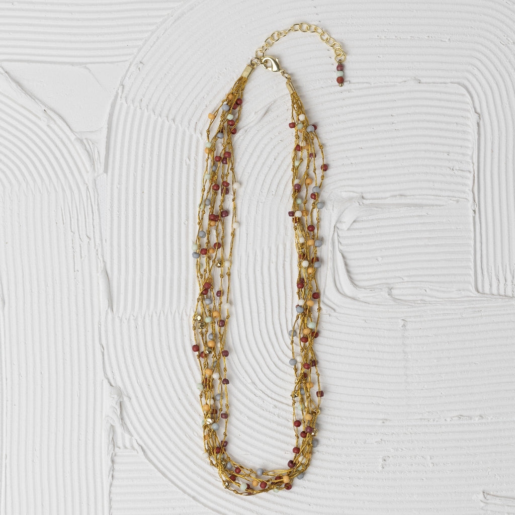 Necklace multistrnd bd bone/zari 17L br/wht/orng