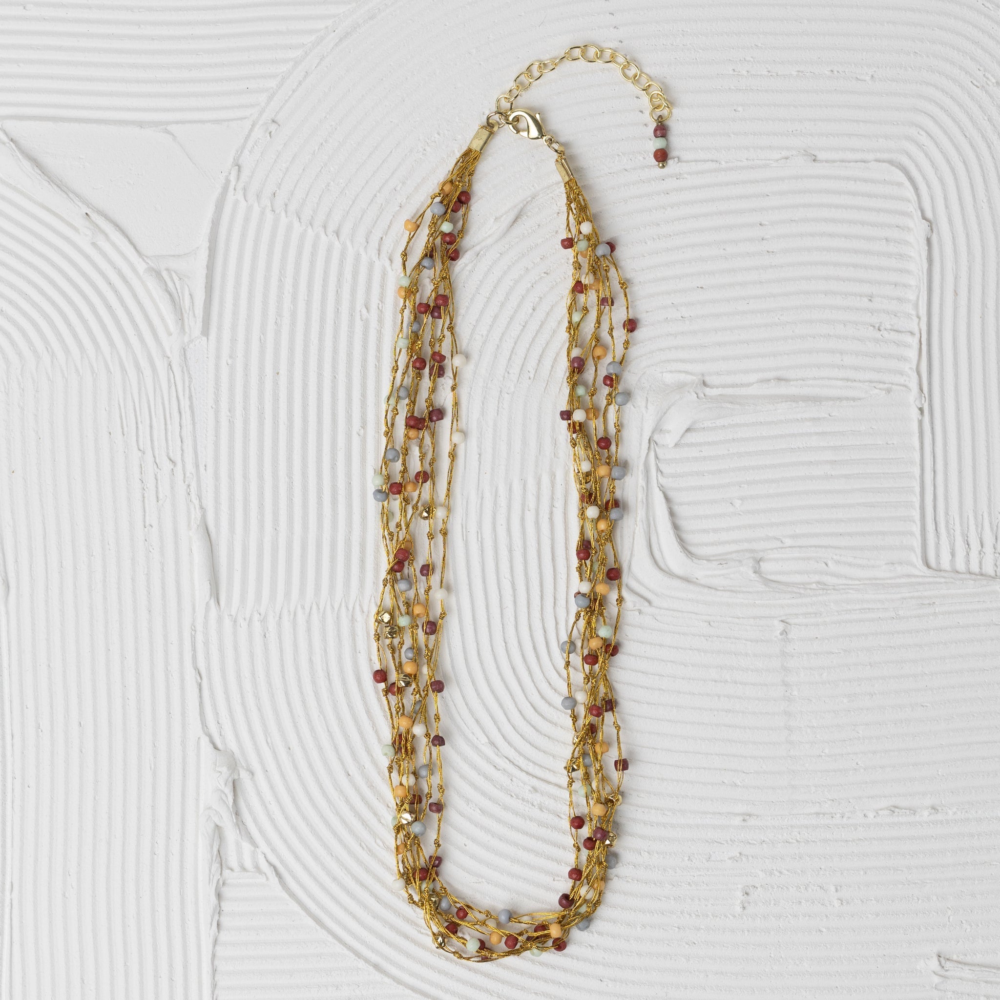 Necklace multistrnd bd bone/zari 17L br/wht/orng
