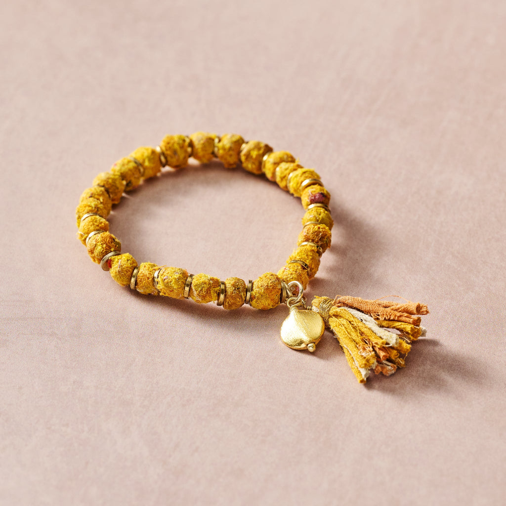 Bracelet beaded w/tassel sari/brss 2.5D yel/brss