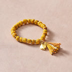 Bracelet beaded w/tassel sari/brss 2.5D yel/brss