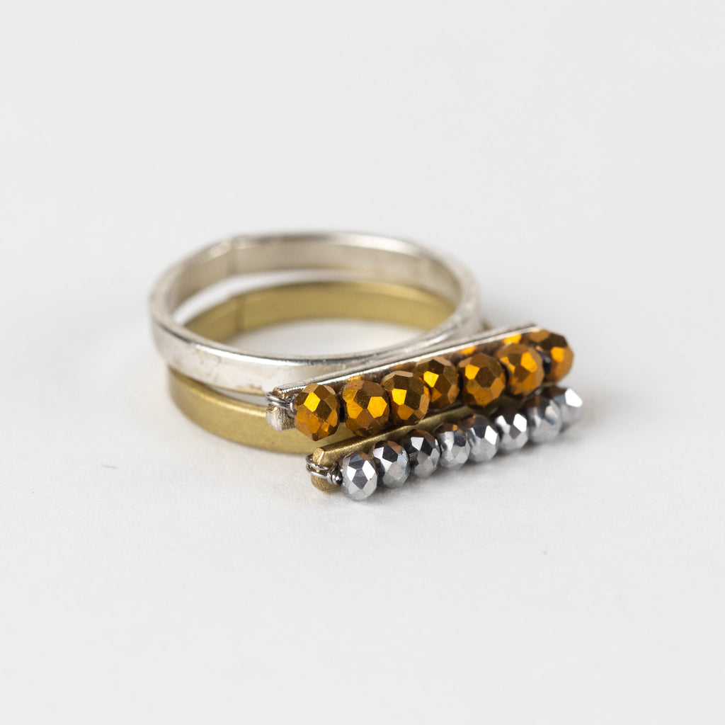 Ring bar of beads M/3 brss/glss .65D brass/silver