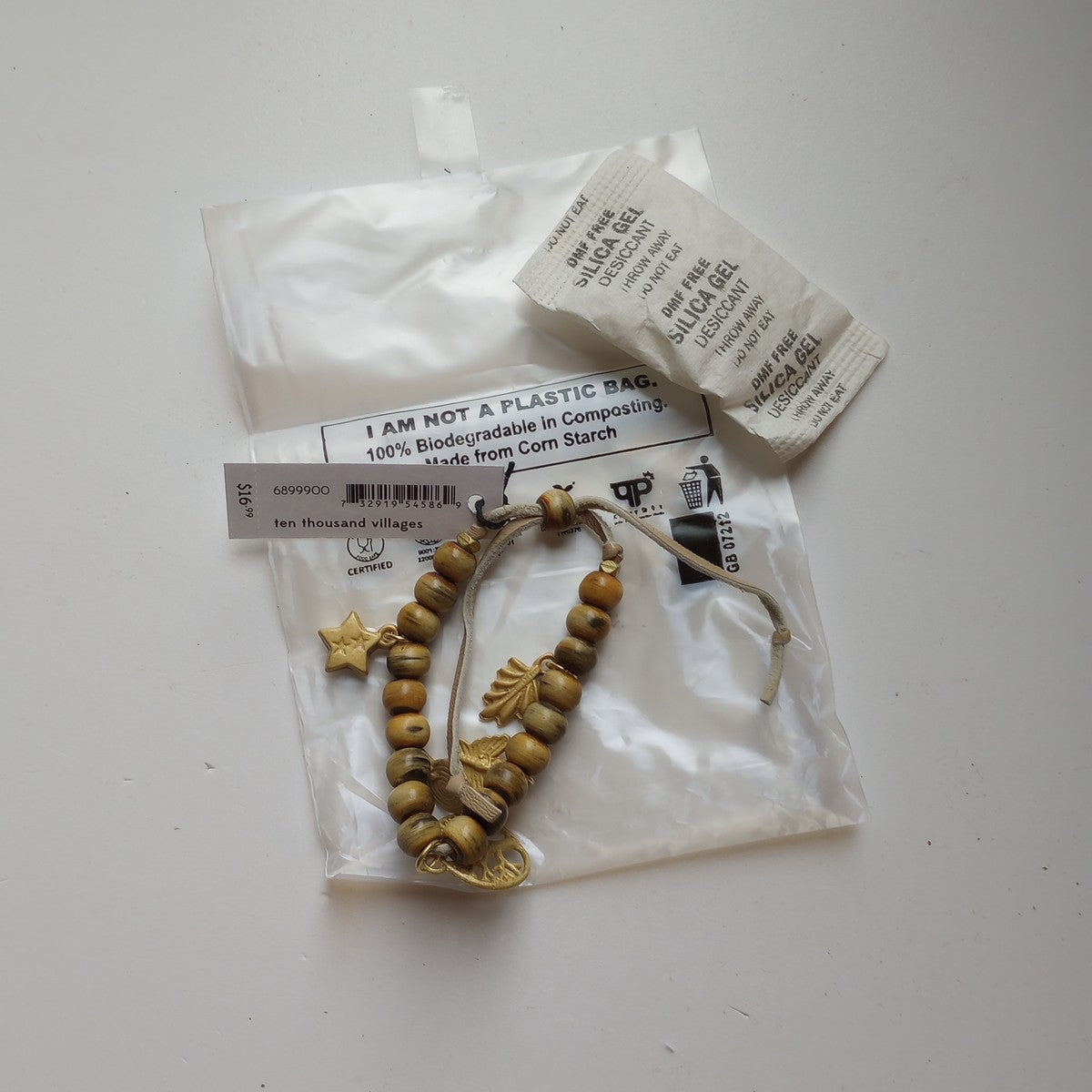 Bracelet beaded charm horn/lthr/brass adj nat/br