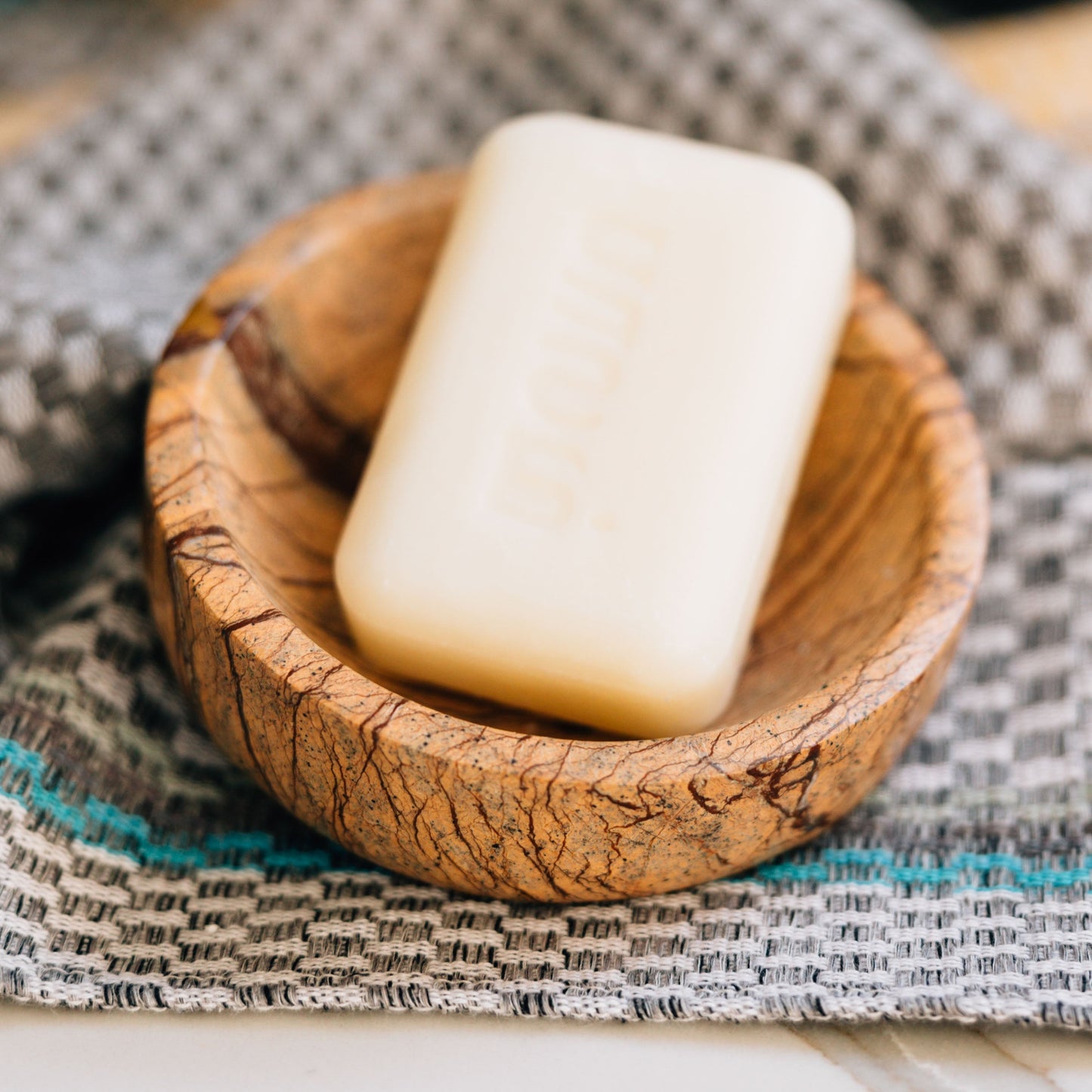 Soap dish angled bidasar stone 4.25Dx2.5 nat/brn