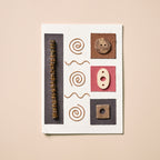 Card geometric M/3 ppr/wd/wr 4.25x6 wht/gld/rd/brn